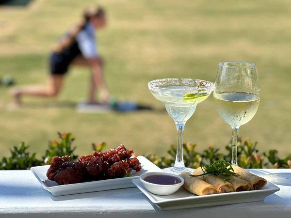 snacks and drinks beside the barefoot bowls green